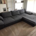 This is a photo of a Grey corner sofa and a cream carpet which have both just been professionally cleaned by K&S Carpet Cleaning